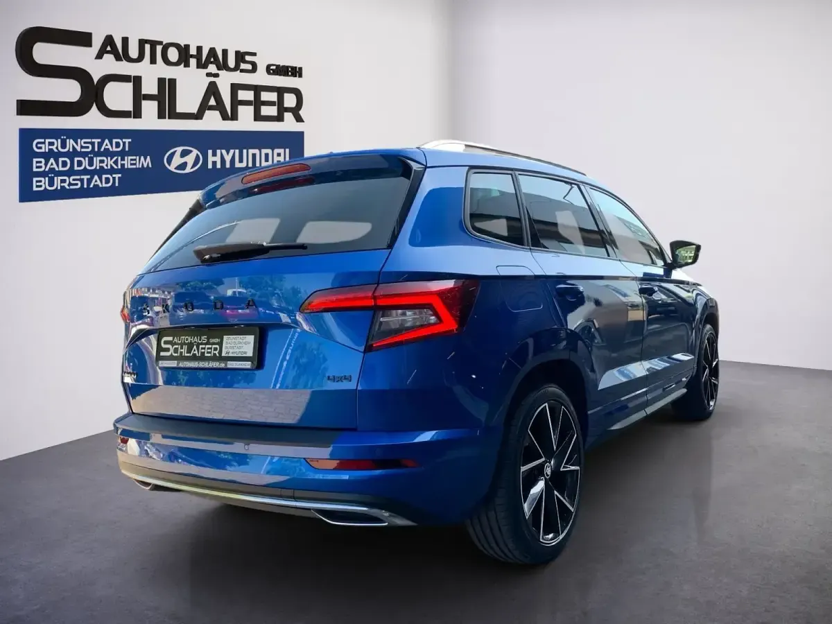 Gebraucht Skoda Karoq SportLine 190 PS (139 kW) 2021 Raceblau metallic SUV