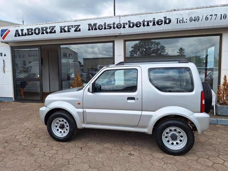 Silber Gebraucht 2011 Suzuki Jimny SUV | 14.499 € (Teuer) - Bild 1/4