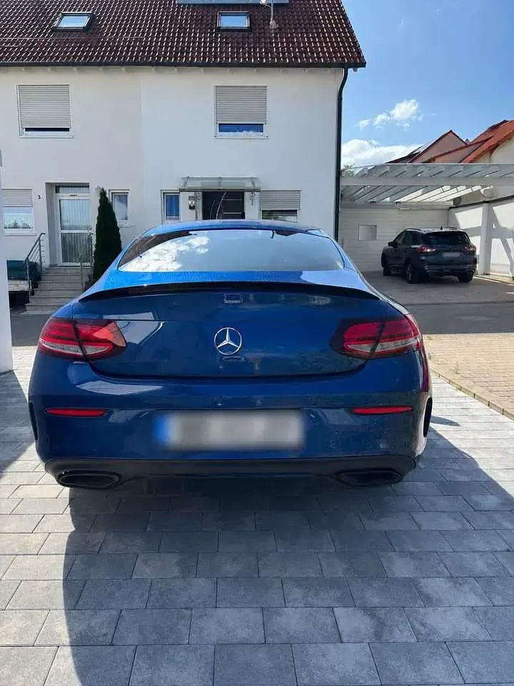 Gebraucht Mercedes C400 AMG line 333 PS (244 kW) 2022 Blau Coupé