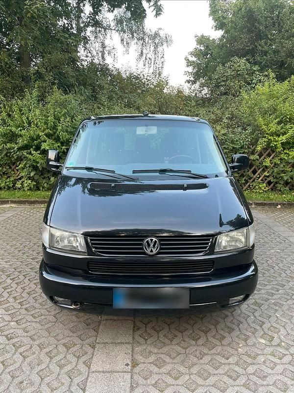 Second-hand VW Caravelle 102 CP (75 kW) 2002 Negru Van