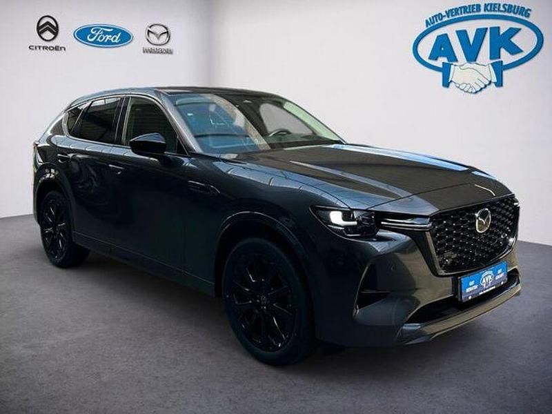 Machine gray Gebraucht 2024 Mazda CX-60 Homura-Line SUV | 46.990 € (Fairer Preis) - Bild 1/4