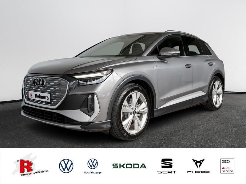 Grau Gebraucht 2022 Audi Q4 e-tron Basis SUV | 33.989 € (Etwas zu teuer) - Bild 1/4
