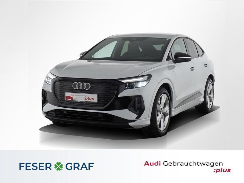 Gletscherweiß metallic Gebraucht 2024 Audi Q4 Sportback e-tron Ambiente SUV | 43.989 € (Fairer Preis) - Bild 1/4