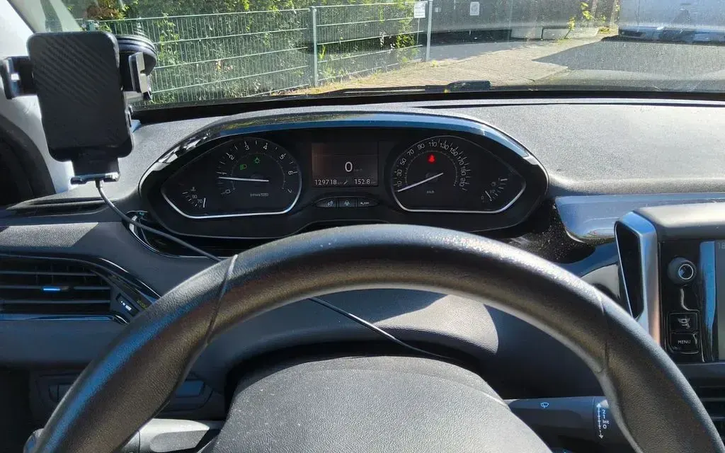 Gebraucht Peugeot 208 Active 82 PS (60 kW) 2012 Braun Kleinwagen