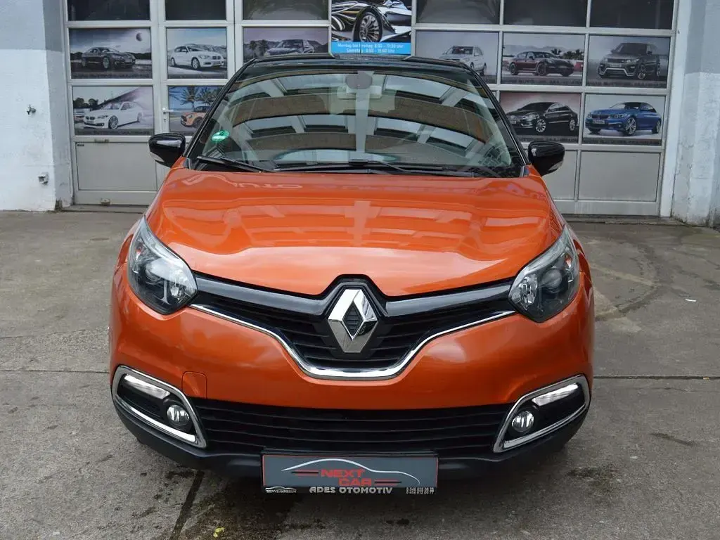 Używany Renault Captur Dynamique 90 KM (66 kW) 2013 Pomarańczowy SUV