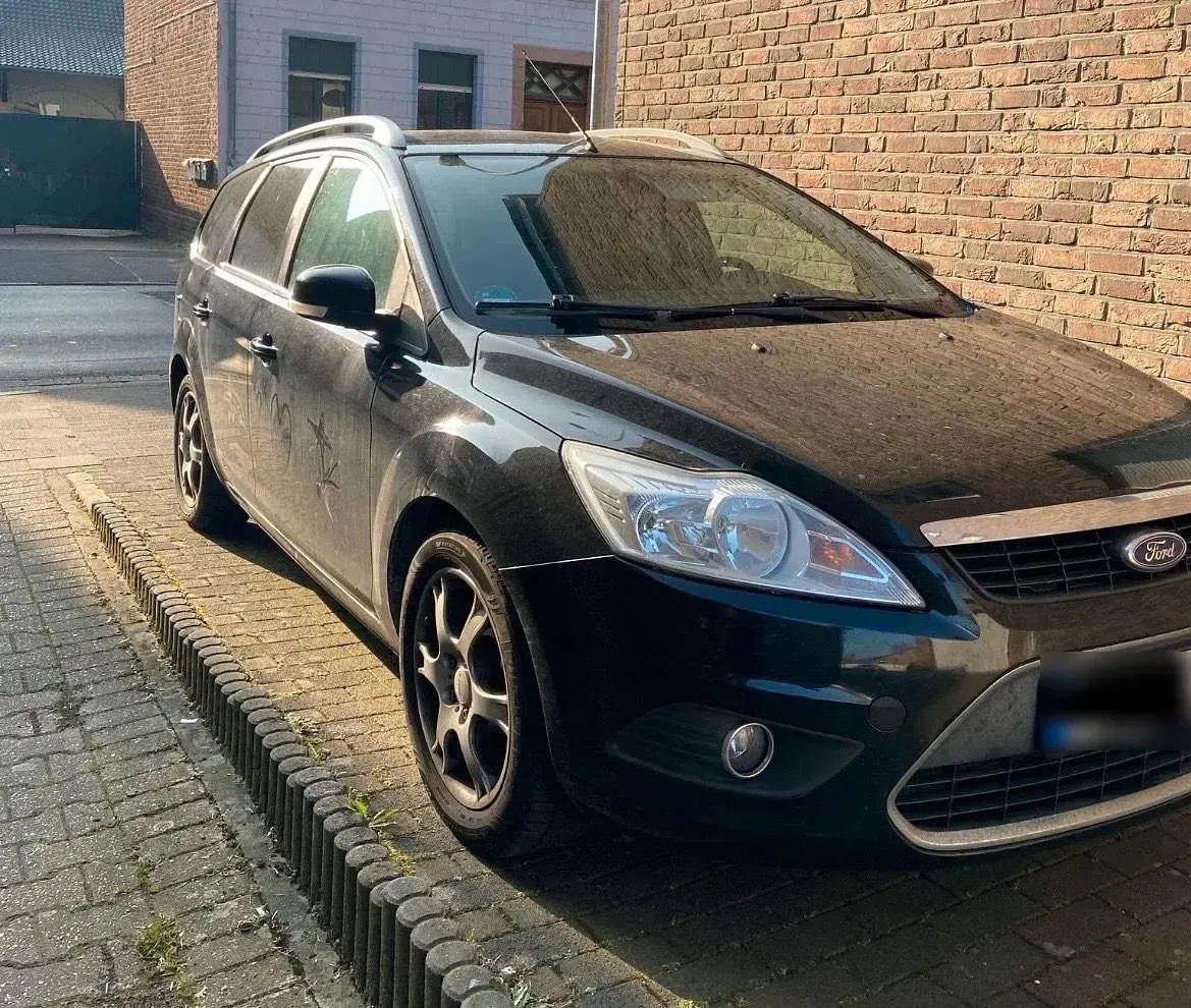 Używany Ford Focus 101 KM (74 kW) 2009 Czarny Kombi