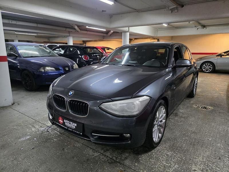 Grau Gebraucht 2013 BMW 118 Advantage Kleinwagen | 6.490 € (Guter Preis) - Bild 1/4