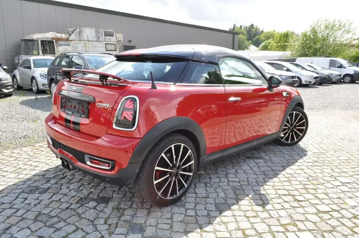 Gebraucht Mini Cooper S Coupé 184 PS (135 kW) 2012 Chili (solar) red Coupé