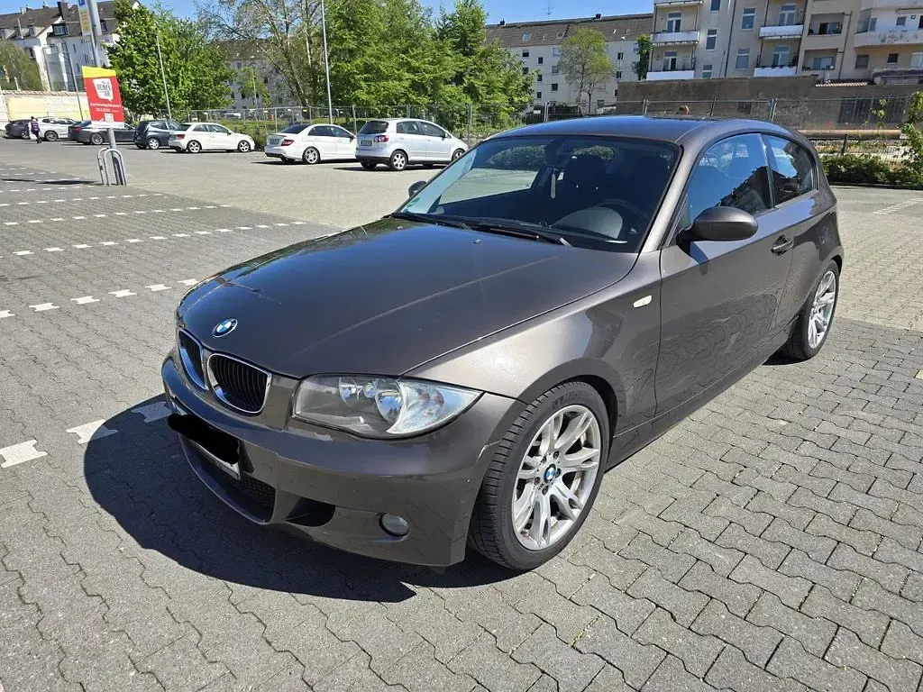 Używany BMW 116 Performance 122 KM (89 kW) 2009 Brązowy Hatchback