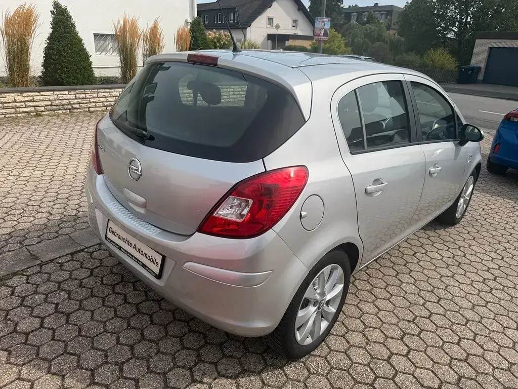 Gebraucht Opel Corsa Active 87 PS (63 kW) 2013 Silber Kleinwagen