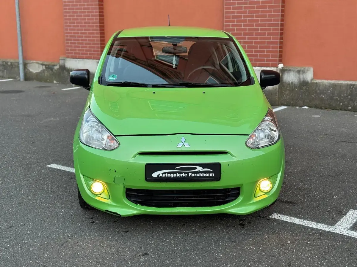Begagnad Mitsubishi Space Star 71 HK (52 kW) 2014 Grön Minibuss