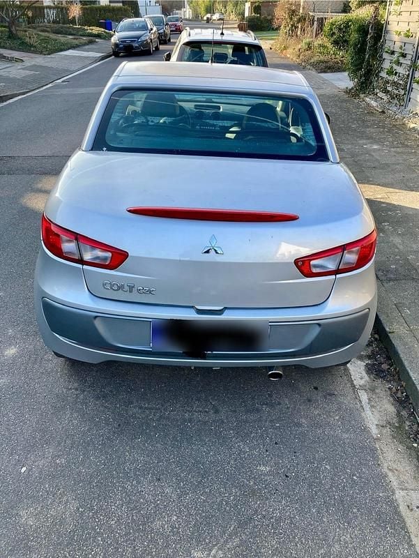 Second-hand Mitsubishi Colt 80 CP (58 kW) 2007 Argintiu Cabrio