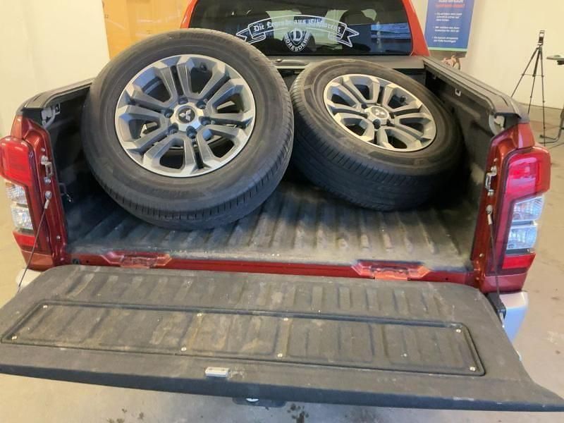 Gebraucht Mitsubishi L200 Top 150 PS (110 kW) 2022 Zirkonorange (metallic) Abholung