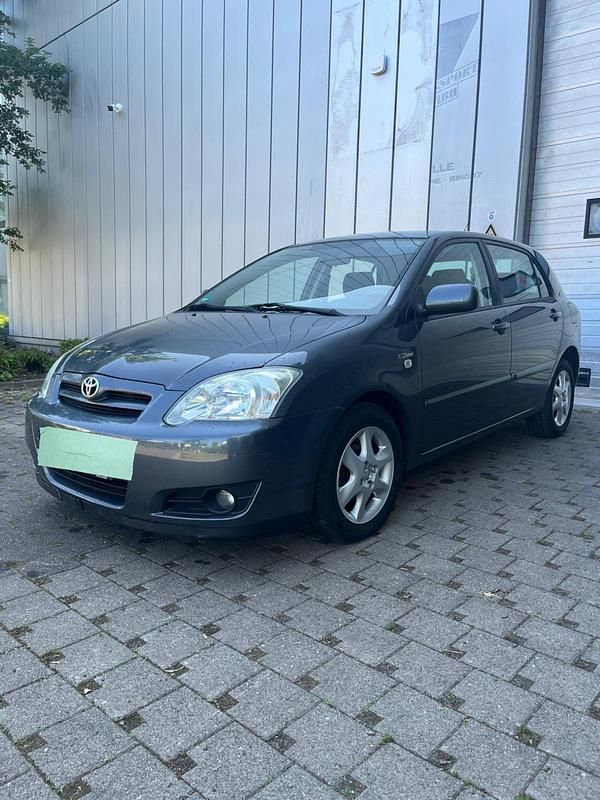 Grau Gebraucht 2006 Toyota Corolla Limousine | 3.790 € (Fairer Preis) - Bild 1/4