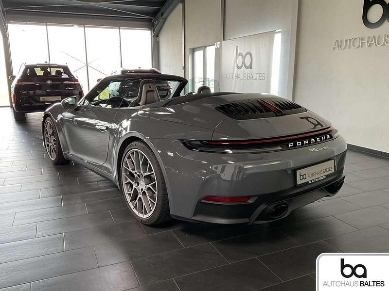 Gebraucht Porsche 992 394 PS (289 kW) 2025 Schiefergrau neo Cabrio