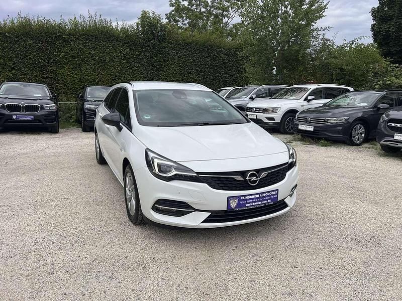 Schneeweiss/olympic Gebraucht 2021 Opel Astra Elegance Kombi | 11.989 € (Superpreis) - Bild 1/4