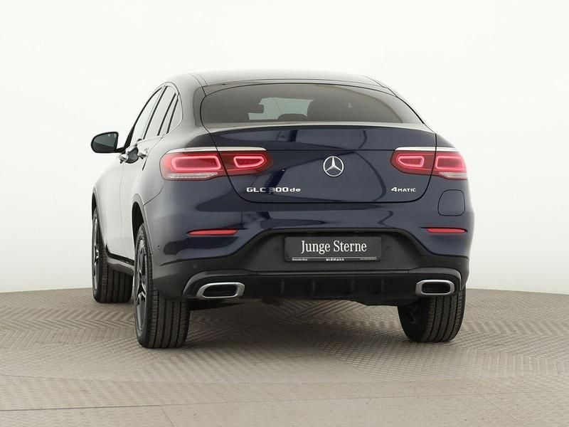 Gebraucht Mercedes GLC300e AMG 306 PS (225 kW) 2022 Cavansitblau metallic Coupé