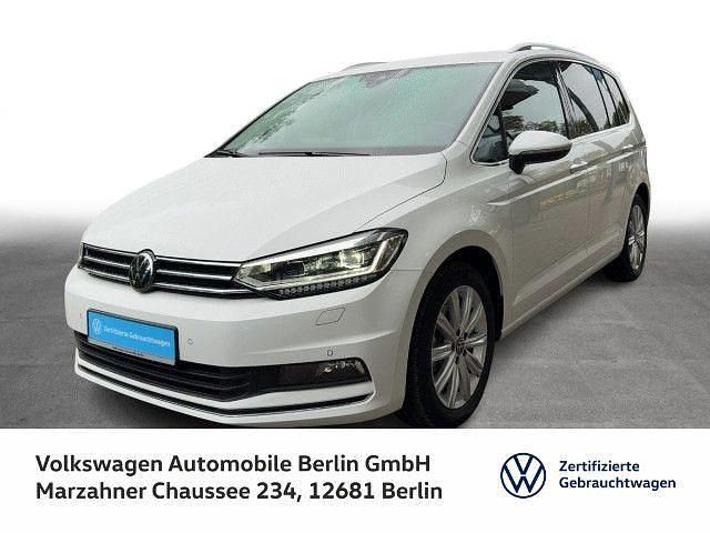 Pure white Gebraucht 2023 VW Touran Highline Van / Kleinbus | 30.830 € (Guter Preis) - Bild 1/3