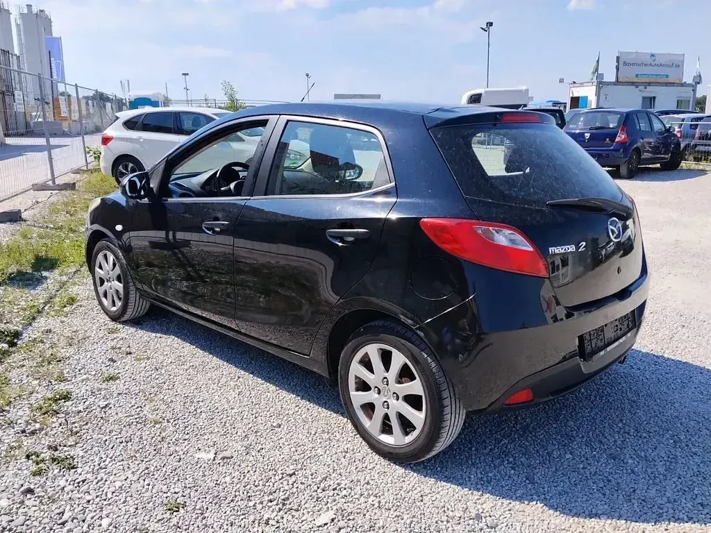 Gebraucht Mazda 2 Impuls 75 PS (55 kW) 2009 Schwarz Kleinwagen