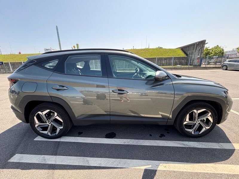 Grau Gebraucht 2023 Hyundai Tucson SUV | 31.450 € (Guter Preis) - Bild 1/4