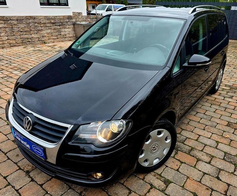 Schwarz Gebraucht 2009 VW Touran Freestyle Van / Kleinbus | 3.999 € (Fairer Preis) - Bild 1/4