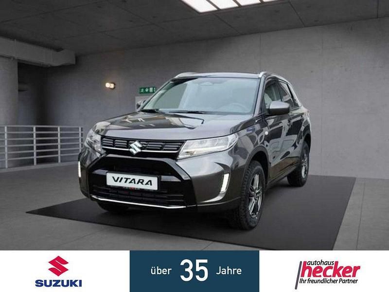Grau Gebraucht 2024 Suzuki Vitara Comfort+ SUV | 27.470 € (Teuer) - Bild 1/4