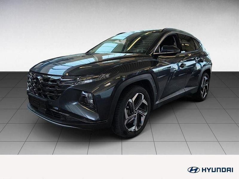 Grey metallic Gebraucht 2024 Hyundai Tucson Trend SUV | 30.980 € (Superpreis) - Bild 1/4