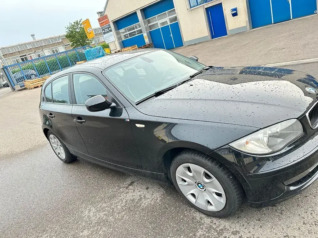 Gebraucht BMW 116 Sport Line 122 PS (89 kW) 2011 Schwarz Kleinwagen