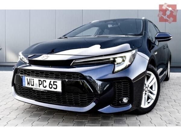 Blau (dark blue mica (dunkelblau)) Gebraucht 2023 Suzuki Swace Comfort+ Kombi | 23.950 € (Fairer Preis) - Bild 1/4