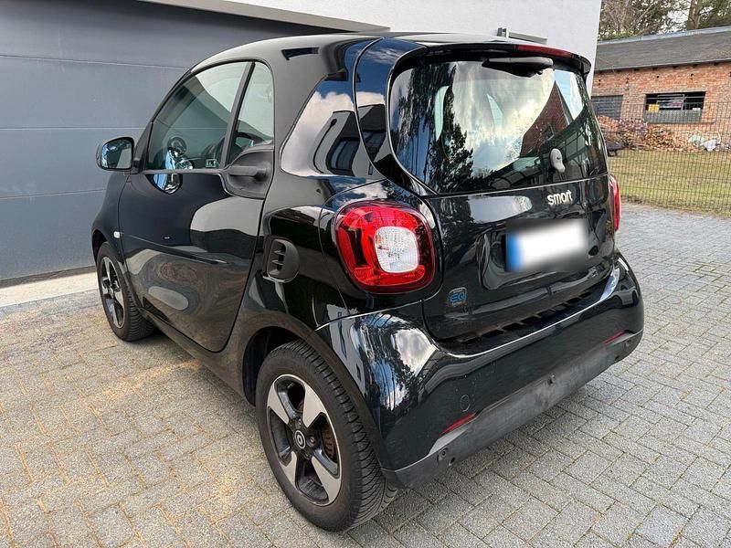 Gebraucht Smart ForTwo Coupé 60 kW (82 PS) 2021 Schwarz Kleinwagen