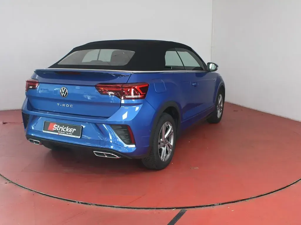 Gebraucht VW T-Roc Cabriolet R-line 150 PS (110 kW) 2025 Ravennablau metallic schwarz (metallic) Cabrio
