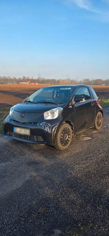 Gebraucht Toyota iQ 68 PS (50 kW) 2011 Schwarz Kleinwagen