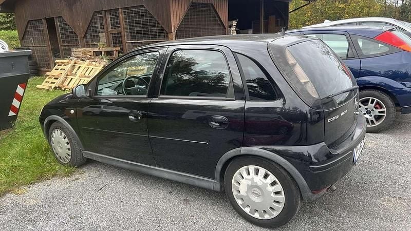 Saphirschwarz mi2 Gebraucht 2006 Opel Corsa Edition Kleinwagen | 1.590 € (Superpreis) - Bild 1/4