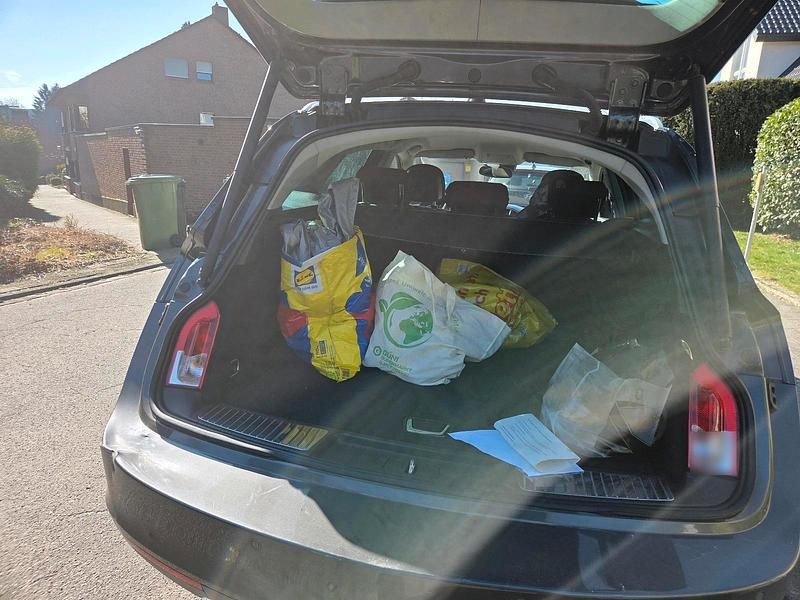 Usado Opel Insignia 160 HP (117 kW) 2012 Cinzento Carrinha