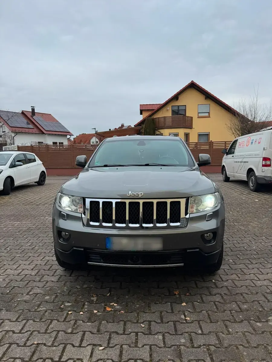 Gebraucht Jeep Grand Cherokee Overland 241 PS (177 kW) 2013 Silber SUV