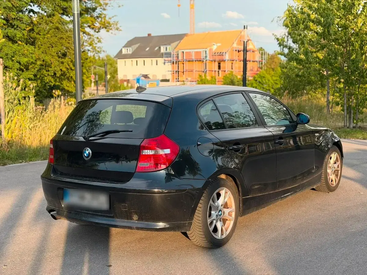 Gebraucht BMW 116 116 PS (85 kW) 2006 Schwarz Kleinwagen