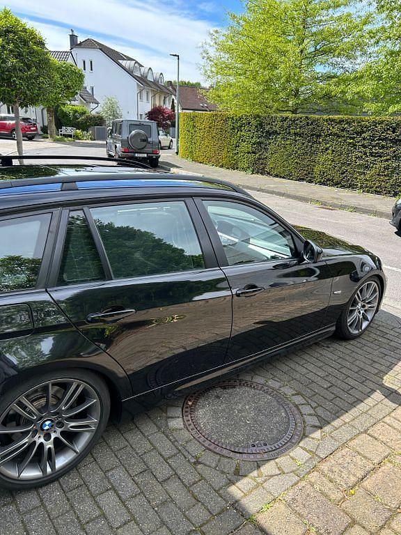 Second-hand BMW 318 Performance 143 CP (105 kW) 2009 Negru Berlinǎ