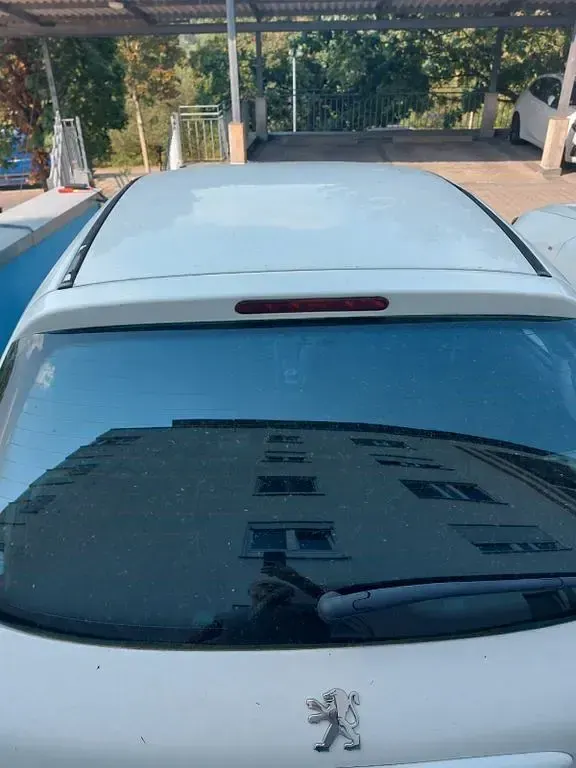 Gebraucht Peugeot 206 60 PS (44 kW) 2009 Weiß Limousine