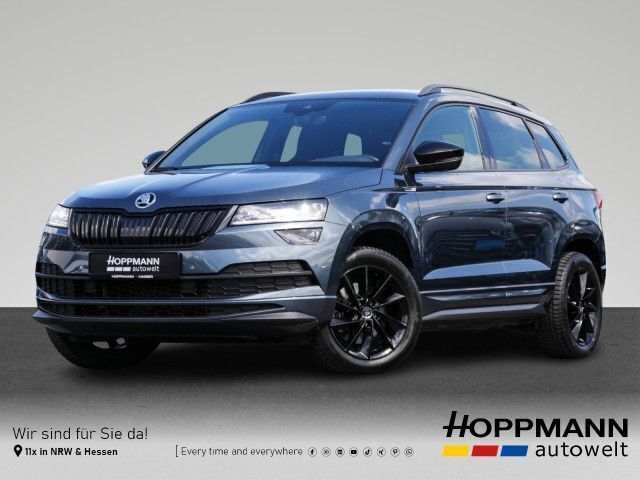 Quarzgrau metallic Gebraucht 2019 Skoda Karoq SportLine SUV | 26.990 € (Fairer Preis) - Bild 1/4