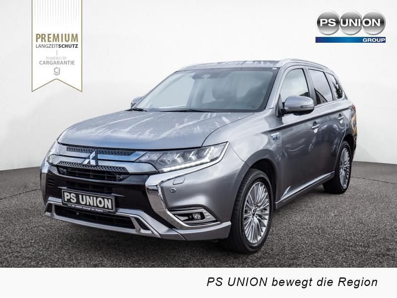 Grau Gebraucht 2020 Mitsubishi Outlander P-HEV Plus SUV | 24.990 € (Fairer Preis) - Bild 1/4
