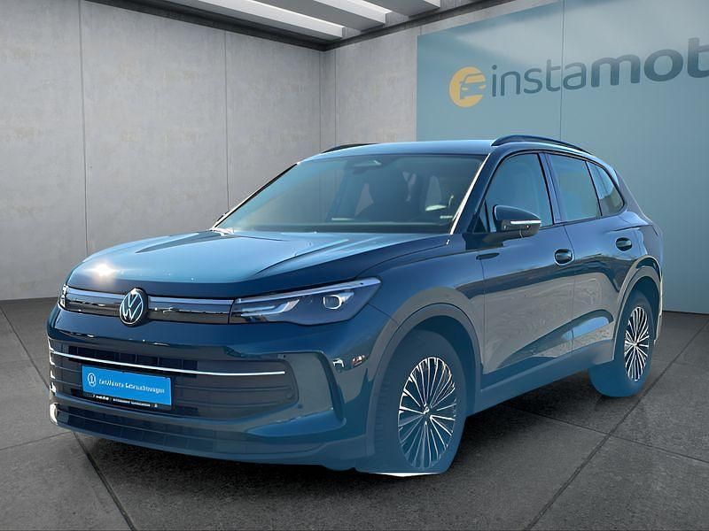 Blau Gebraucht 2024 VW Tiguan SUV | 37.099 € (Fairer Preis) - Bild 1/4