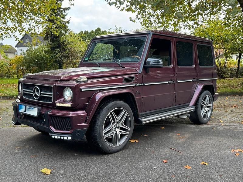 Rot Gebraucht 2006 Mercedes G55 AMG AMG line SUV | 49.900 € - Bild 1/4