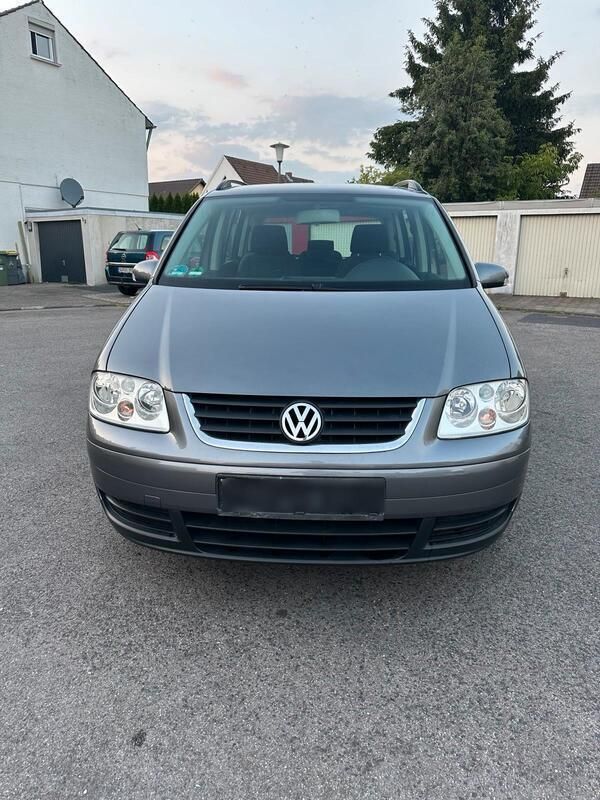 Grau Gebraucht 2006 VW Touran Van / Kleinbus | 2.950 € (Fairer Preis) - Bild 1/4
