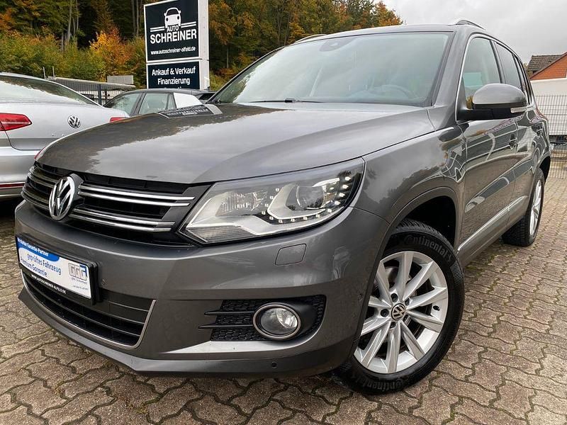 Grau Gebraucht 2015 VW Tiguan Sportline SUV | 12.950 € (Guter Preis) - Bild 1/4