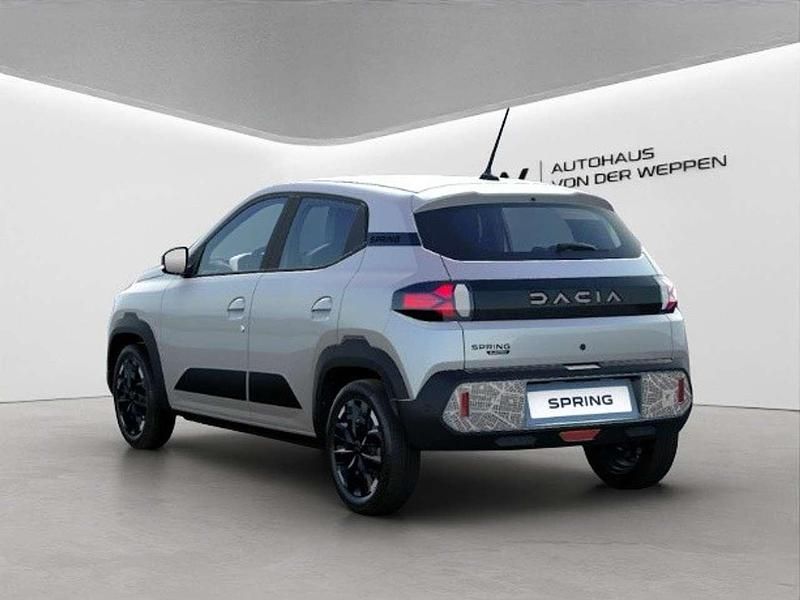 Gebraucht Dacia Spring Extreme 47 kW (65 PS) 2024 Lightninggrau Kleinwagen