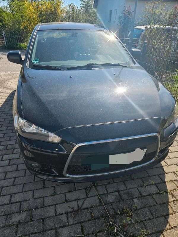 Schwarz Gebraucht 2011 Mitsubishi Lancer Limousine | 2.500 € - Bild 1/4