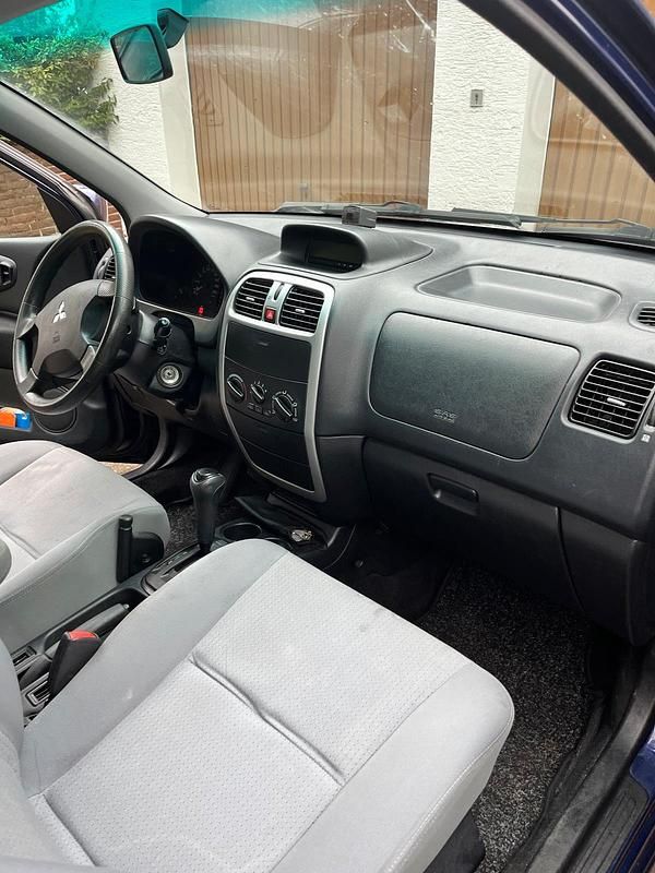 Gebraucht Mitsubishi Space Star 86 PS (63 kW) 2002 Blau Limousine