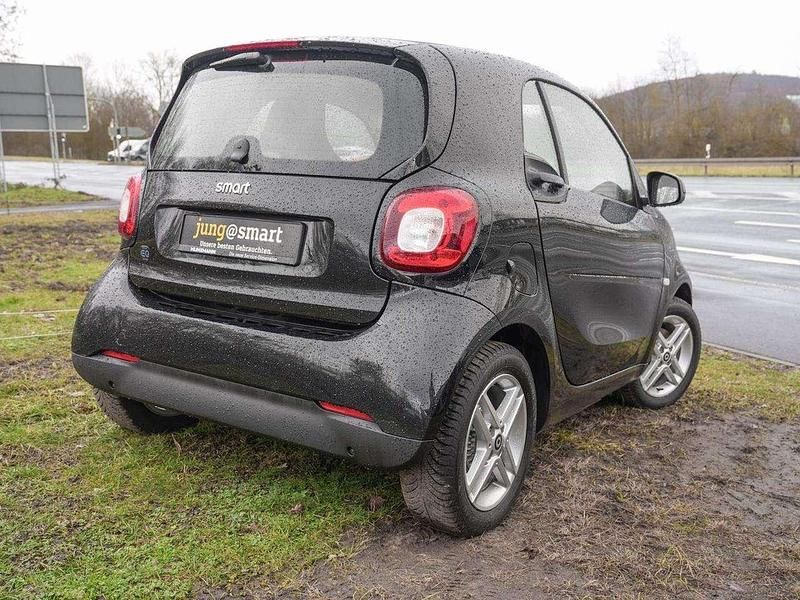 Gebraucht Smart ForTwo Coupé 60 kW (82 PS) 2023 Bodypanels in black Kleinwagen
