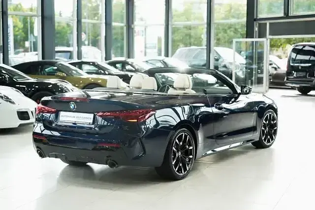 Gebraucht BMW 430 Cabriolet M Sport 245 PS (180 kW) 2024 Tansanitblau ii metallic Cabrio
