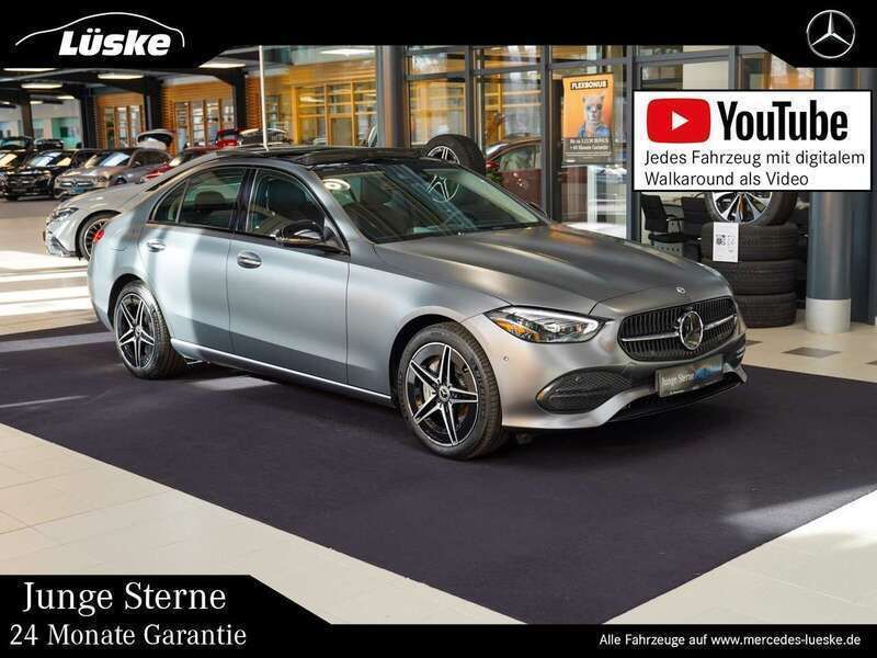 Grau Gebraucht 2022 Mercedes C400 AMG line Limousine | 54.900 € - Bild 1/4